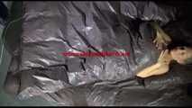 Sexy SANDRA wearing ONLY a sexy shiny nylon shorts posing and lolling in a shiny nylon cloth on a bed (Video)