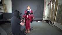 Ms Ungeniert tied gagged and played with in shiny nylon Rainwear part 1/2