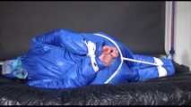 Lucy tied and gagged with ropes on bed wearing sexy blue oldschool downwear (Video)