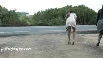 030051 Salma & Lucia Pee Together By The Side Of A Busy Road