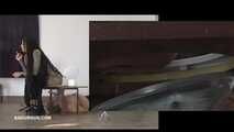 Mistress Cleo squirts cologne into the mouth of the slave lying in the toilet. Picture in Picture