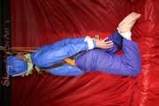 Sexy Sonja being tied and gagged with ropes and a clothgag hanging wearing a sexy rainwear combination (Pics)