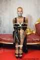 Miss Francine bound and gagged with layers of gags in a sexy PVC dress