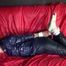 Sexy Courtney being tied and gagged on a sofa wearing sexy shiny nylon rainwear (Video)