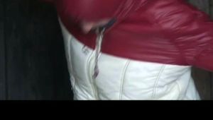 03:40 Min. video with Katharina tied and gagged in a shiny nylojn downjacket