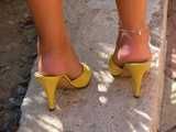 yellow leather mules and tits