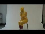 03:00 Min. video with Jill tied and gagged in a shiny nylon yellow rainsuit