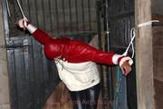 Katharina tied and gagged in a shiny nylon downjacket