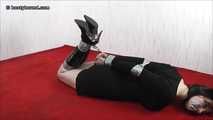 Daphne in hogtie photographed