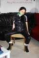 Lucy tied and gagged with rope and gag on a chair wearing a sexy black shiny nylon jumpsuit (Pics) 