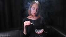 Dasha is smoking in the studio