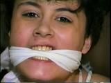 18 YR OLD LATINA CUTIE GETS MOUTH STUFFED WITH SPONGE, TIED IN WITH ROPE, PLASTIC WRAP STUFFED IN MOUTH, CLEAVE GAGGED, TIT TIED & HANDGAGGED  (D50-6)