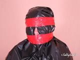 [From archive] Liska overhead trash bag packed with red duct tape