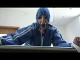 0318 min video with Jill tied and gagged in shiny rainwear