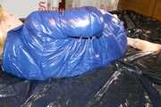 Pia lying on the bed wearing a sexy rainpants anda bra and putting on a pamy down jacket (Pics)
