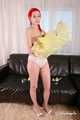 Morrigan - posing in yellow trash bag dress
