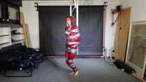 Myxxxy bound and gagged in shiny nylon Rainwear
