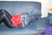 Jill tied, gagged and double hooded on a sofa wearing supersexy oldschool rainwear (Pics)