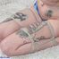 Tattoo girl in ropes