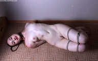 Amanda hogtied nude on floor