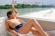 Stella and Leonie on a boat wearing sexy shiny nylon shorts and bikini tops (Pics)