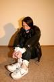 One of our archive girls bound and gagged in shiny nylon down