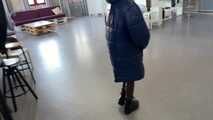 Rey Sanson bound and gagged in a shiny Downcoat