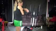 Watching sexy Sandra during her workout wearing a sexy green shiny nylon shorts and a black top (Video)