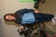 Get a huge package of 1430 pictures with Stella in shiny nylon rainwear from 2005-2008!
