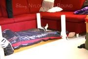 Mara tied and gagged on a bottom-up table wearing a supersexy black/red downwear combination (Pics)