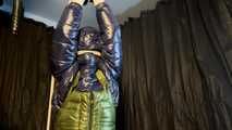 Sebastien tied by the hands in a down jacket.