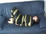 Get 3 classic archive videos with Katharina bound and gagged in shiny nylon rainwear