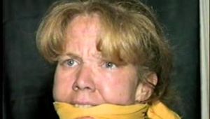 38 Yr OLD CASHIER ATTIC BOUND & GAGGED IN A BLACK LEATHER DRESS (D24-6)