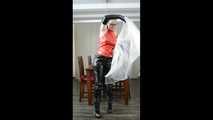 Selfbondage in full PVC outfit and transparent raincoat