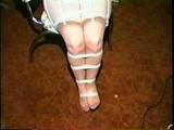 25 YR OLD CHARLENE IS WRAP GAGGED & CHAIR TIED TO A CHAIR WITH WHITE CLOTH MEDICAL TAPE (D47-14)