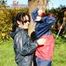 Jill and her friend in the garden playing with eachother wearing sexy shiny nylon rainwear (Pics)