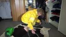 Pia wearing sexy yellow shiny nylon rainwear cleaning up the studio (Video)