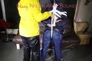Sandra beeing tied and gagged by Stella in Shiny Nylon Rainwear crotchrope-suspended 