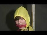 03:00 Min. video with Alina tied and gagged in shiny shorts 