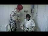 Get 2 Videos with Dani bound and gagged in shiny nylon Downwear from 2008.