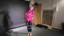 Rachel Adams bound, Pantygagged and Pantyhooded in a shiny nylon Downjacket