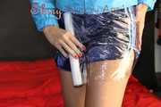 Watching sexy Pia being envelopped in film wearing a sexy blue shiny nylon shorts and a lightblue shiny nylon rainjacket (Pics)