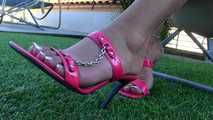 pink heels dangling