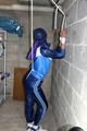 Alina tied and gagged in shiny nylon clothes
