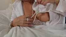 Mature lady Cara tease with boobs on bed
